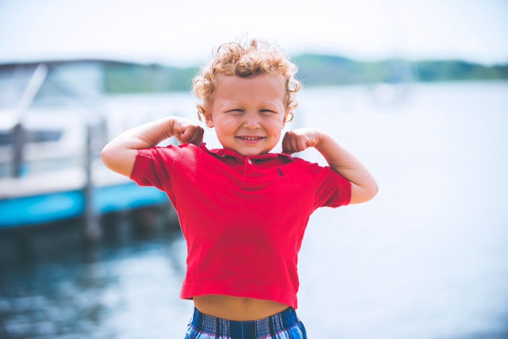 boy wearing red t-shirt