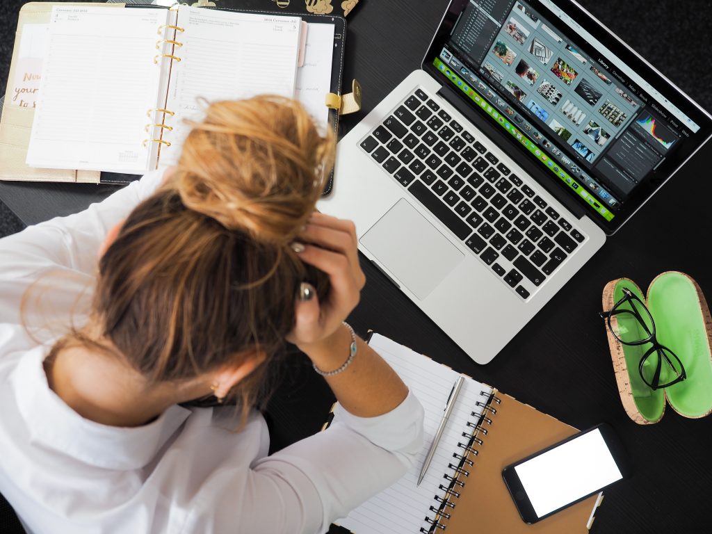 Girl confused on laptop