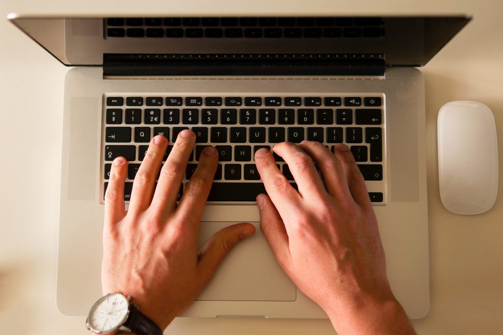 male hands typing