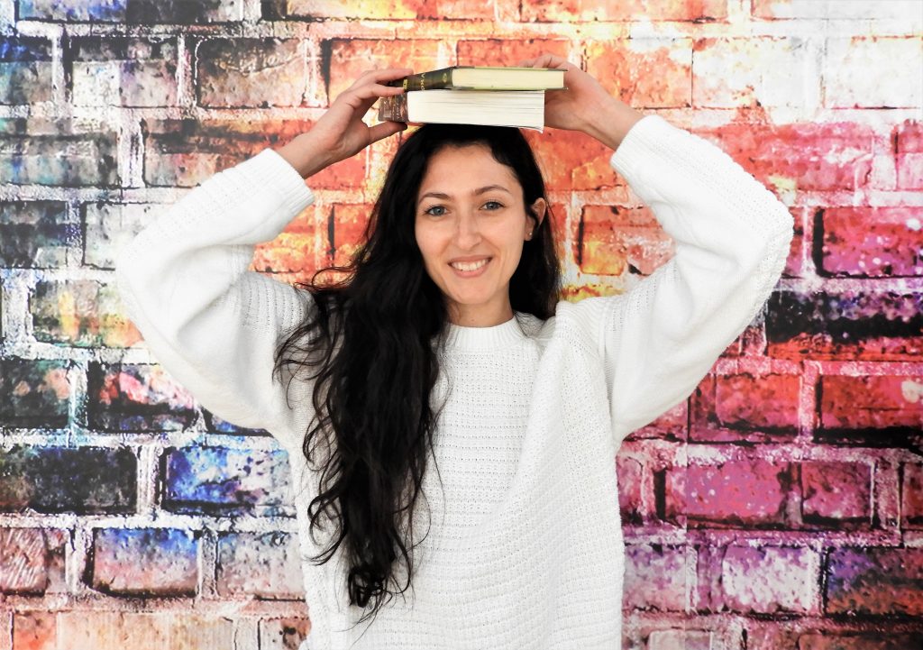 woman with book on head