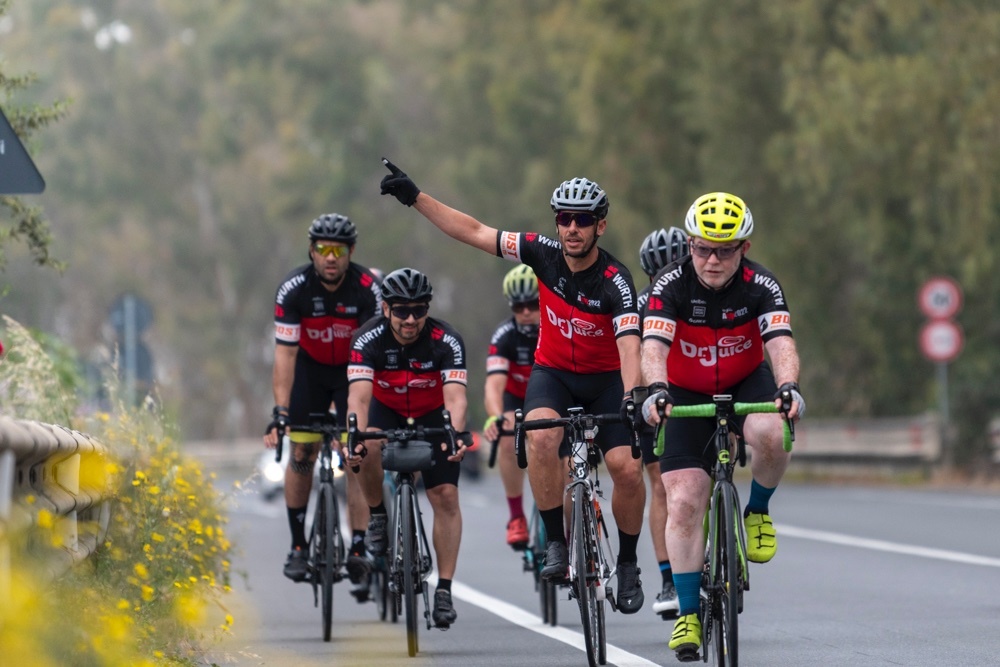 A group of riders in cycling gear